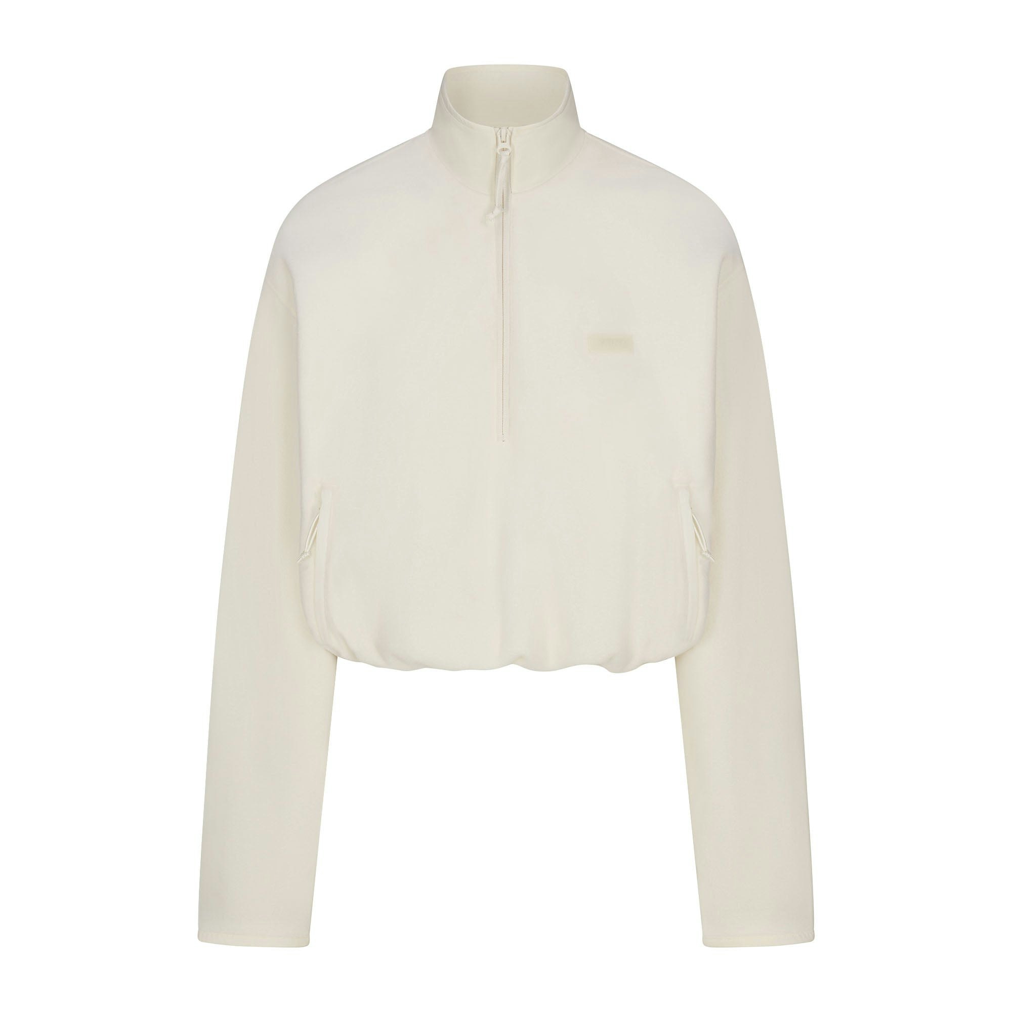 OUTDOOR FLEECE HALF ZIP PULLOVER | ECRU FLAT ON A WHITE BACKGROUND | FLT