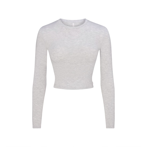 SKIMS SLEEP SUPER CROPPED LONG SLEEVE | LIGHT HEATHER GREY FLAT ON A WHITE BACKGROUND | FLT