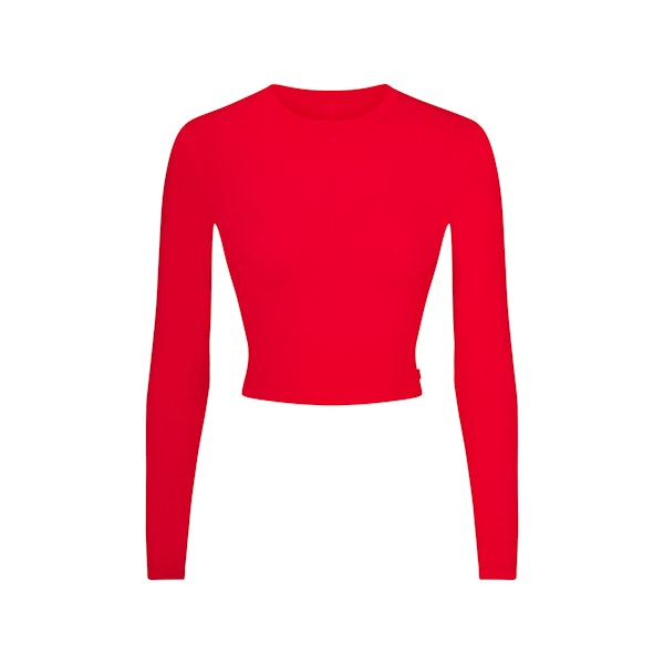 SKIMS SLEEP SUPER CROPPED LONG SLEEVE | RUBY FLAT ON A WHITE BACKGROUND | FLT