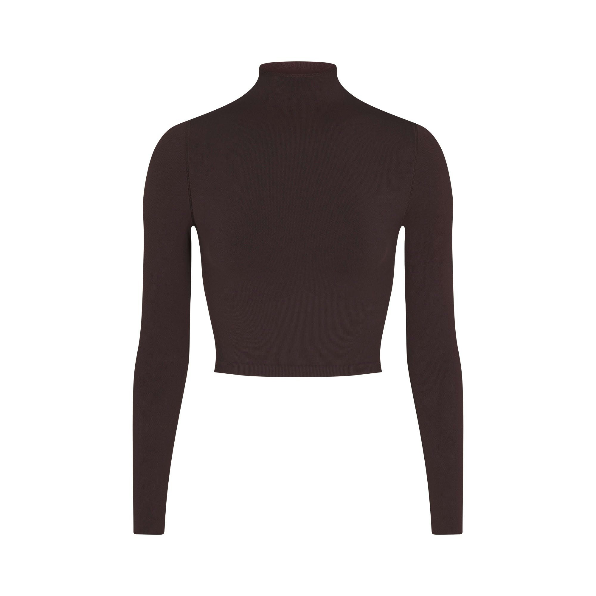 NikeSKIMS VINTAGE SEAMLESS MOCK NECK CROP TOP | PHOENIX FLAT ON A WHITE BACKGROUND | FLT