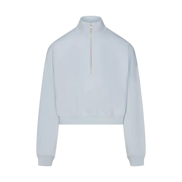 DRAPEY FRENCH TERRY HALF ZIP | POWDER BLUE FLAT ON A WHITE BACKGROUND | FLT