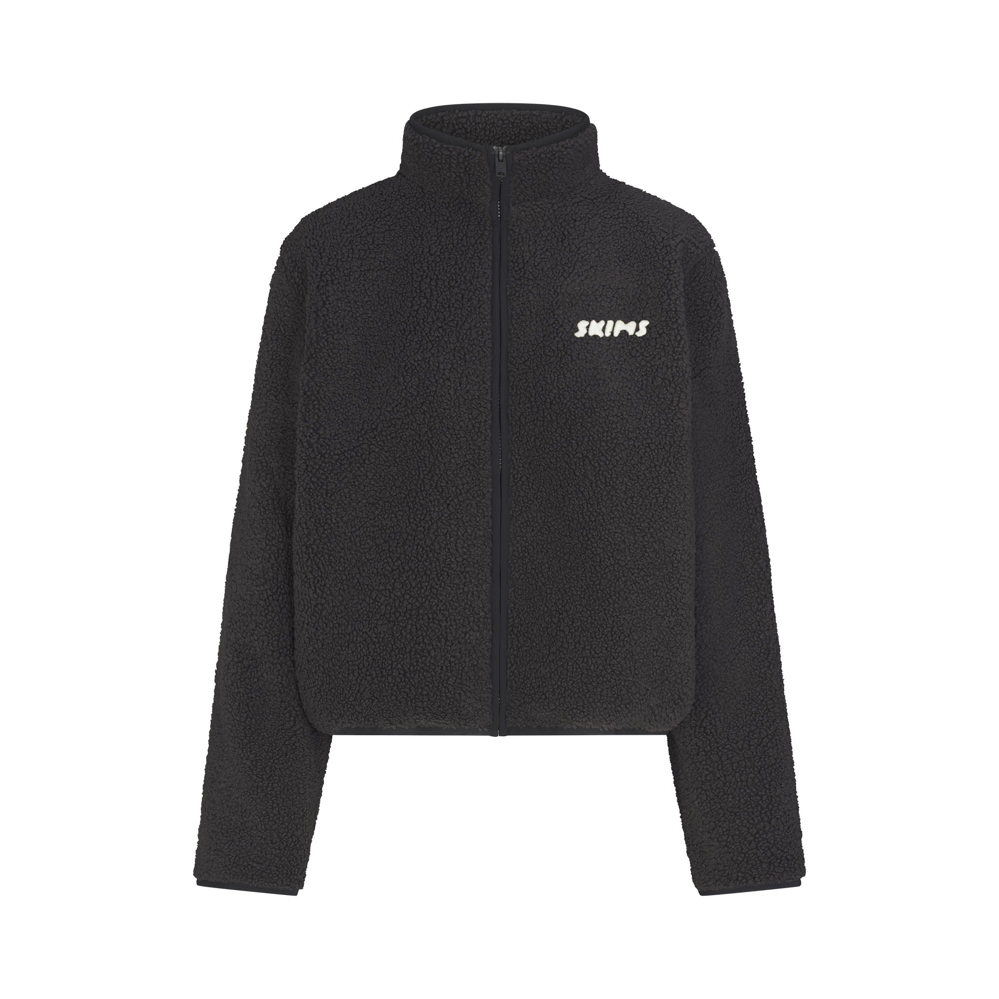 TEDDY BOXY ZIP UP JACKET | ONYX FLAT ON A WHITE BACKGROUND | FLT