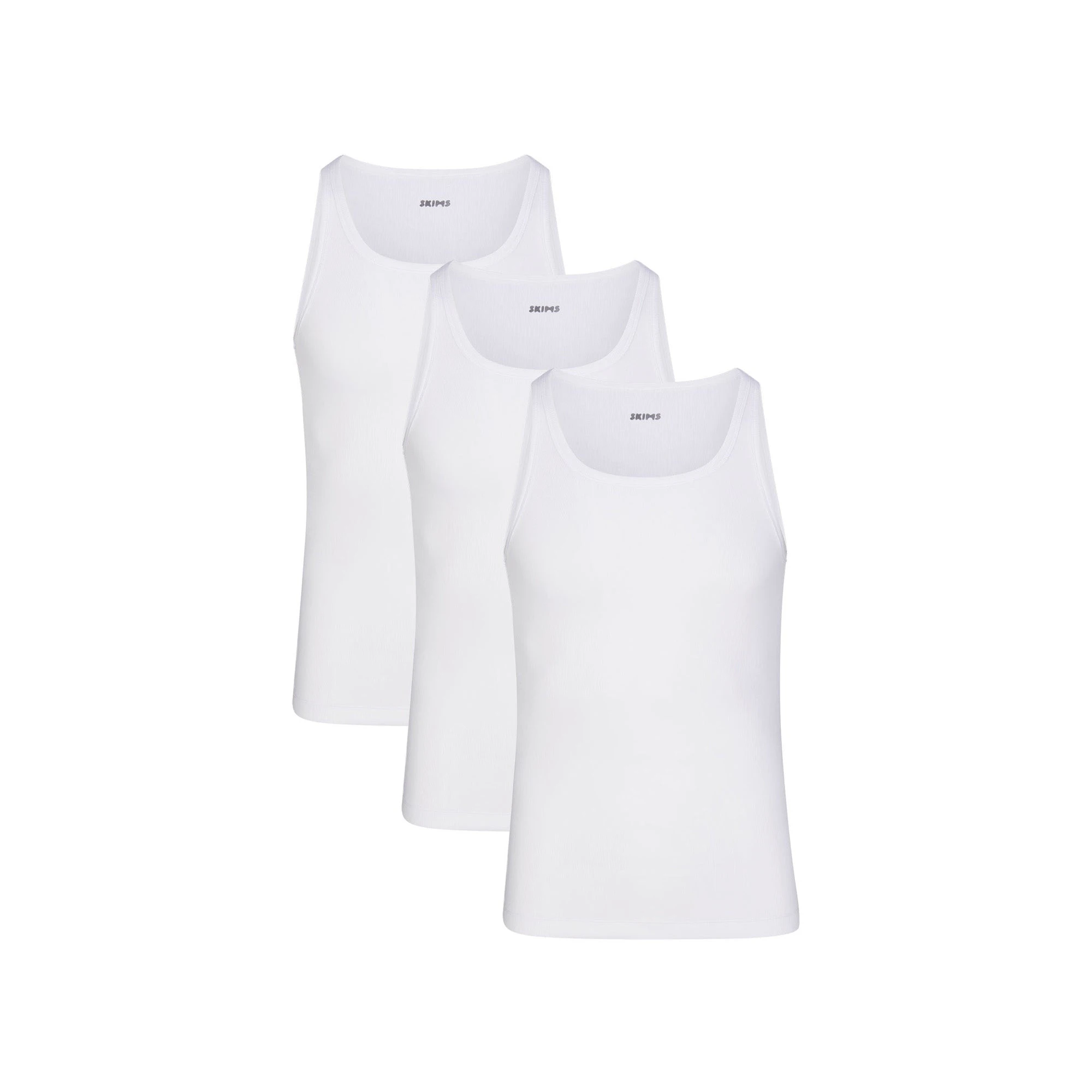 SKIMS COTTON MENS RIB TANK 3-PACK LAYS FLAT ON A WHITE BACKGROUND | FLT | FOCUS: 0.0, 1.0, 0.9
