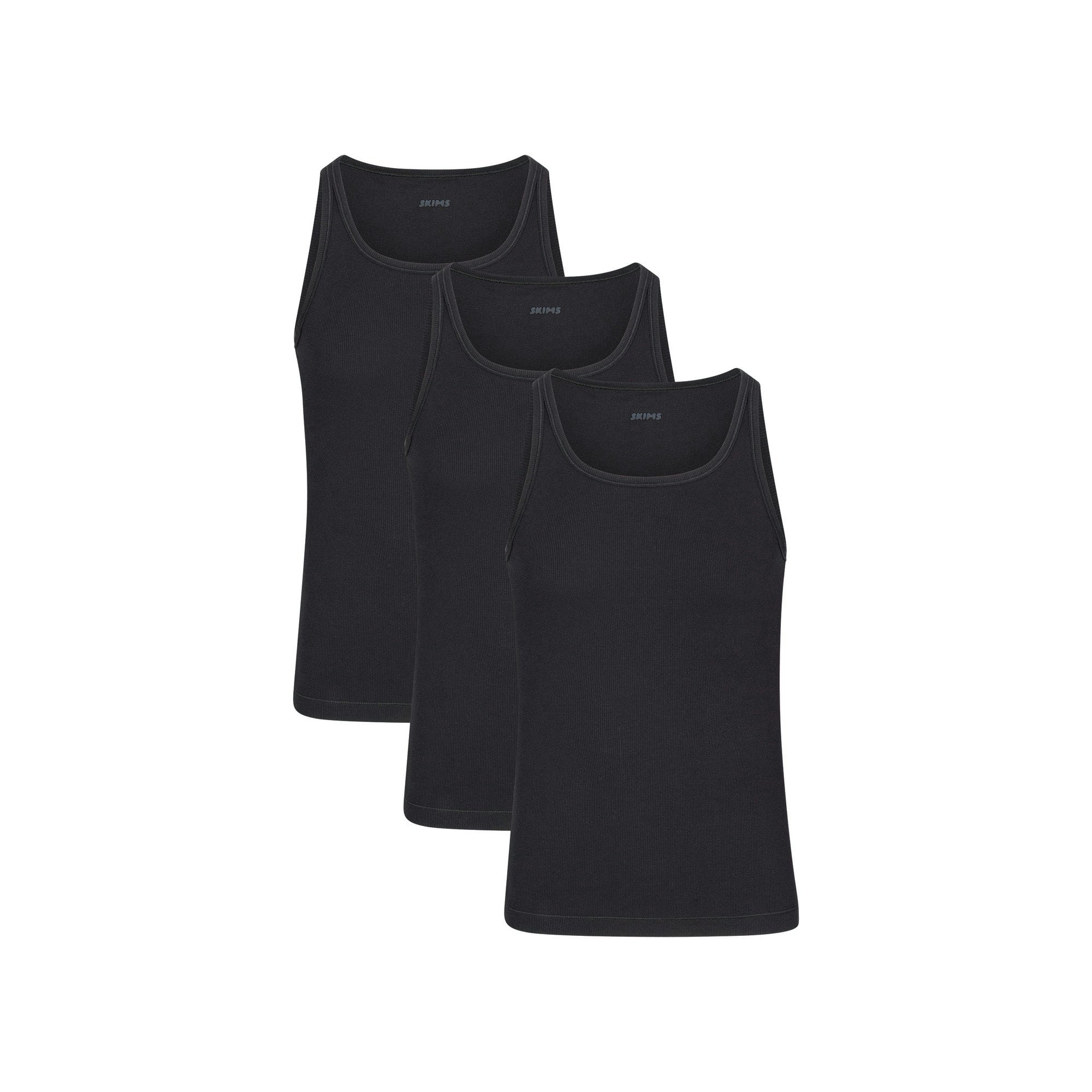 SKIMS COTTON MENS RIB TANK 3-PACK LAYS FLAT ON A WHITE BACKGROUND | FLT | FOCUS: 0.0, 1.0, 0.9