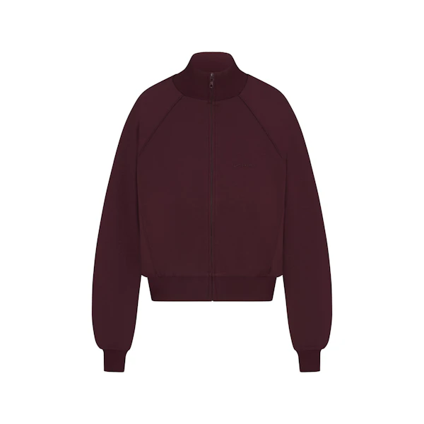 NikeSKIMS MATTE TRICOT TRACK JACKET | CURRANT FLAT ON A WHITE BACKGROUND | FLT