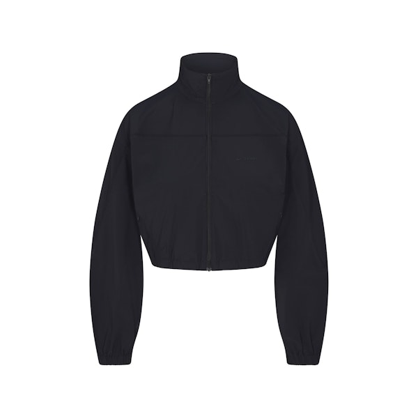 NikeSKIMS WOVEN NYLON CROP JACKET | OBSIDIAN FLAT ON A WHITE BACKGROUND | FLT