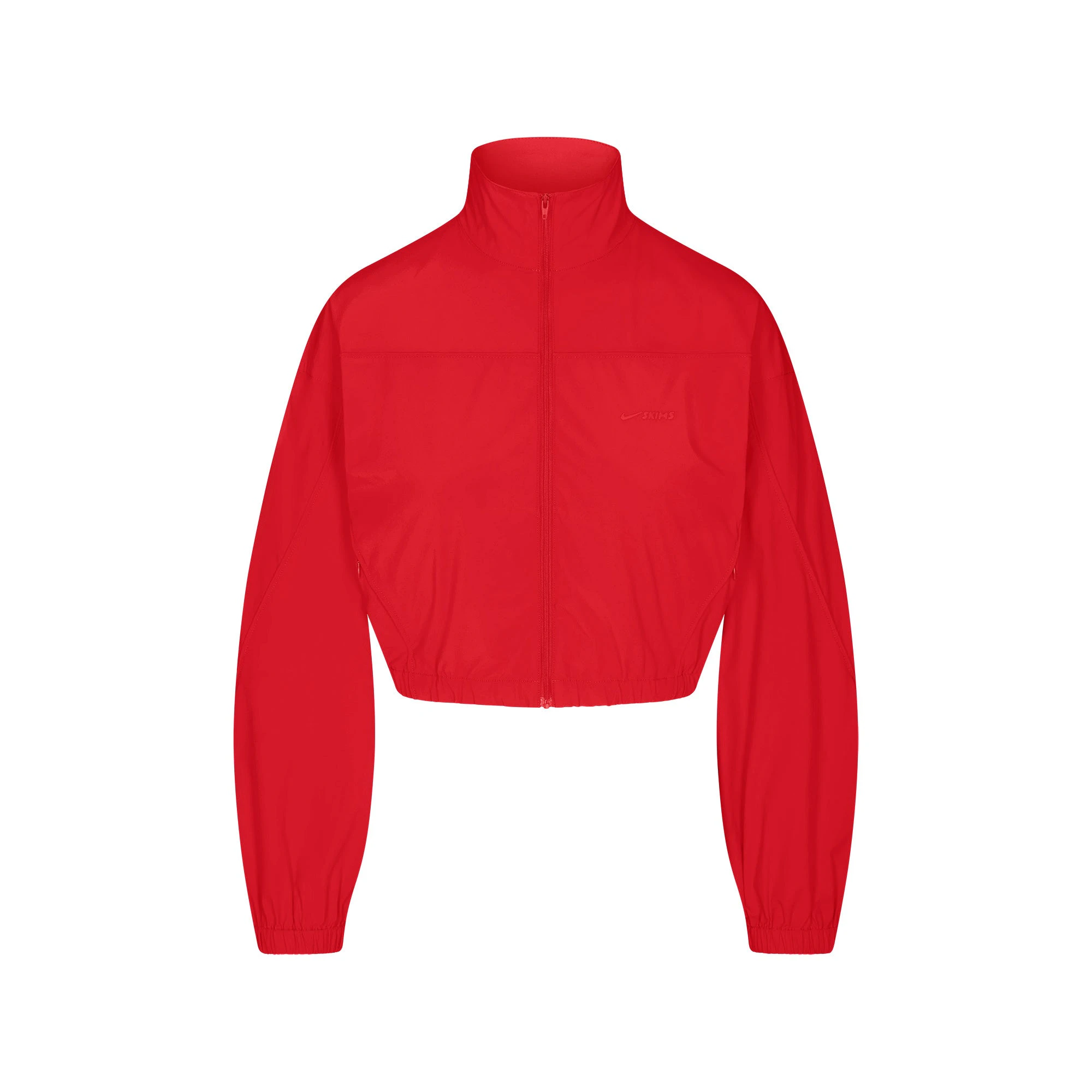 NikeSKIMS WOVEN NYLON CROP JACKET | RUBY FLAT ON A WHITE BACKGROUND | FLT
