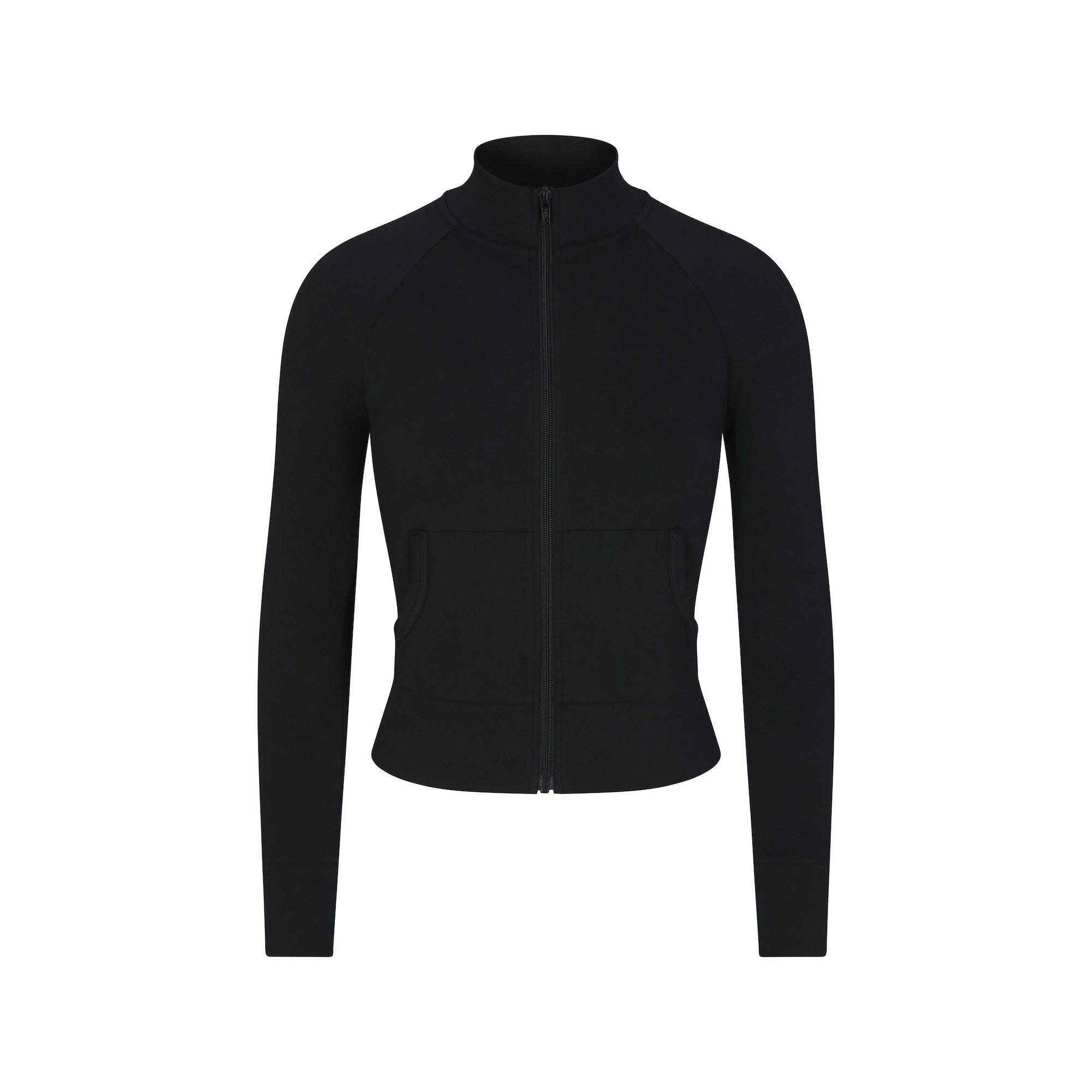 OUTDOOR TRACK JACKET | ONYX LAYS FLAT ON A WHITE BACKGROUND | FLT