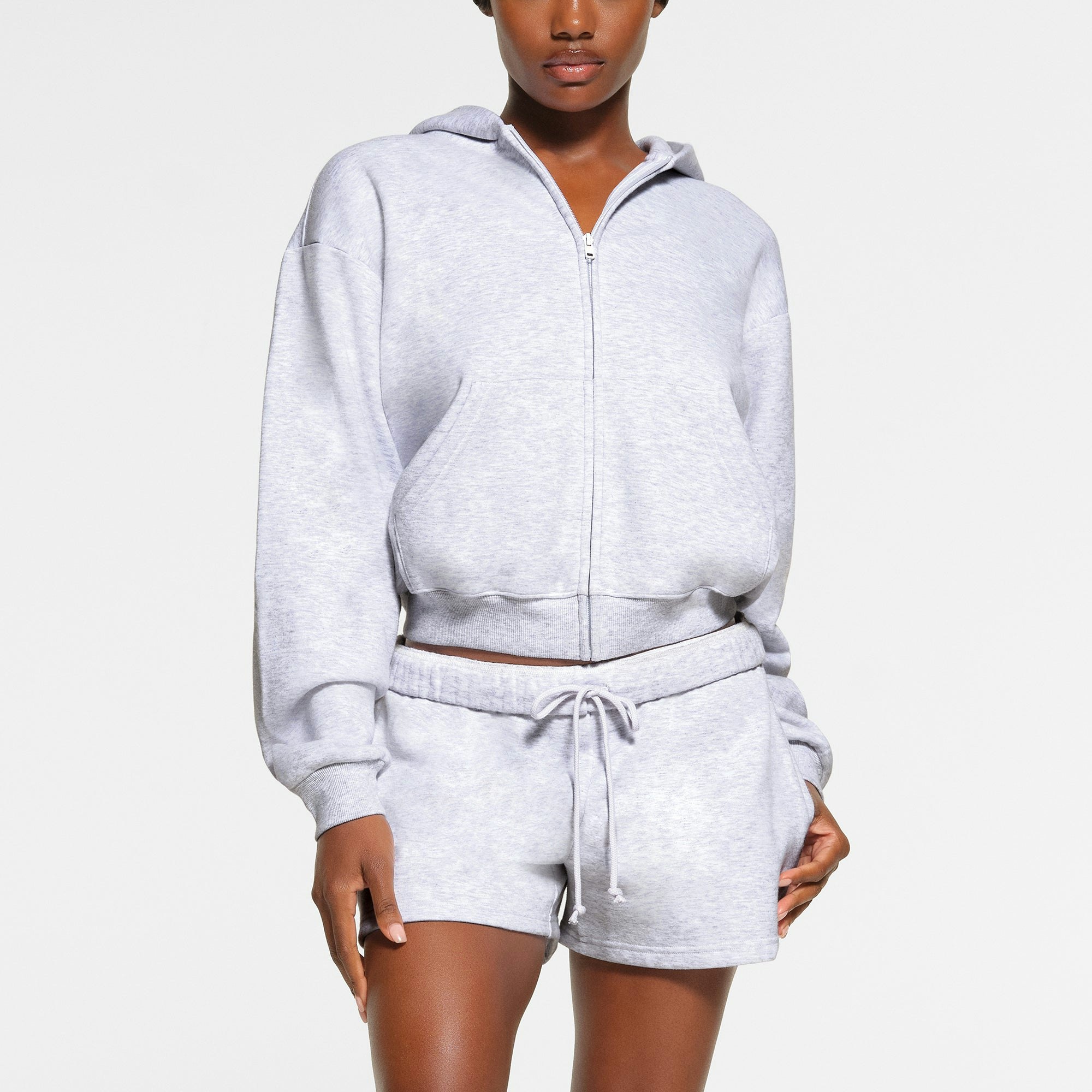 COTTON FLEECE CLASSIC ZIP UP HOODIE WORN BY A MODEL IN FRONT VIEW
