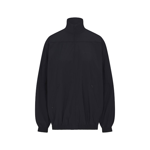 NikeSKIMS WOVEN NYLON OVERSIZED TRACK JACKET | OBSIDIAN FLAT ON A WHITE BACKGROUND | FLT