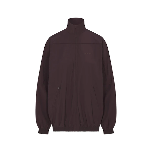 NikeSKIMS WOVEN NYLON OVERSIZED TRACK JACKET | PHOENIX FLAT ON A WHITE BACKGROUND | FLT