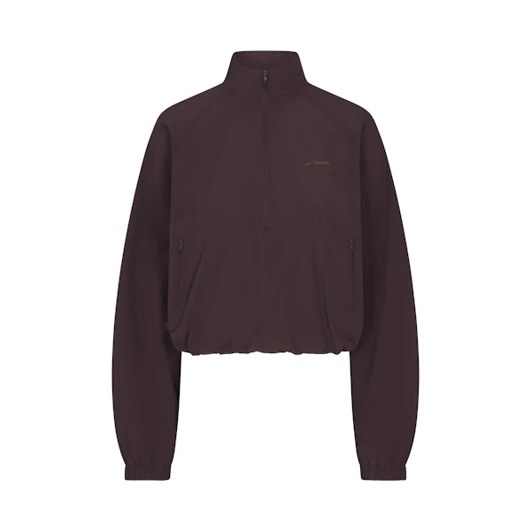 NikeSKIMS WOVEN NYLON HALF ZIP JACKET | PHOENIX FLAT ON A WHITE BACKGROUND | FLT