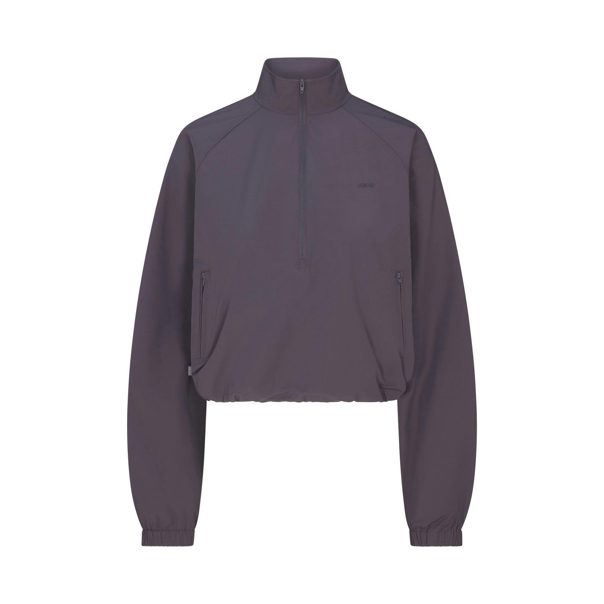 NikeSKIMS WOVEN NYLON HALF ZIP JACKET | RAVEN FLAT ON A WHITE BACKGROUND | FLT