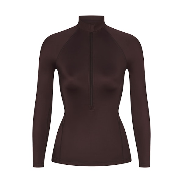 NikeSKIMS SHINE LONG SLEEVE HALF ZIP | PHOENIX FLAT ON A WHITE BACKGROUND | FLT
