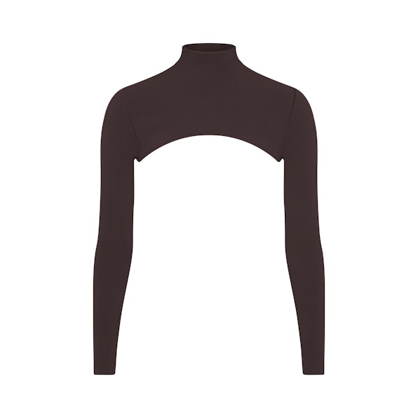 NikeSKIMS VINTAGE SEAMLESS SHRUG | PHOENIX FLAT ON A WHITE BACKGROUND | FLT