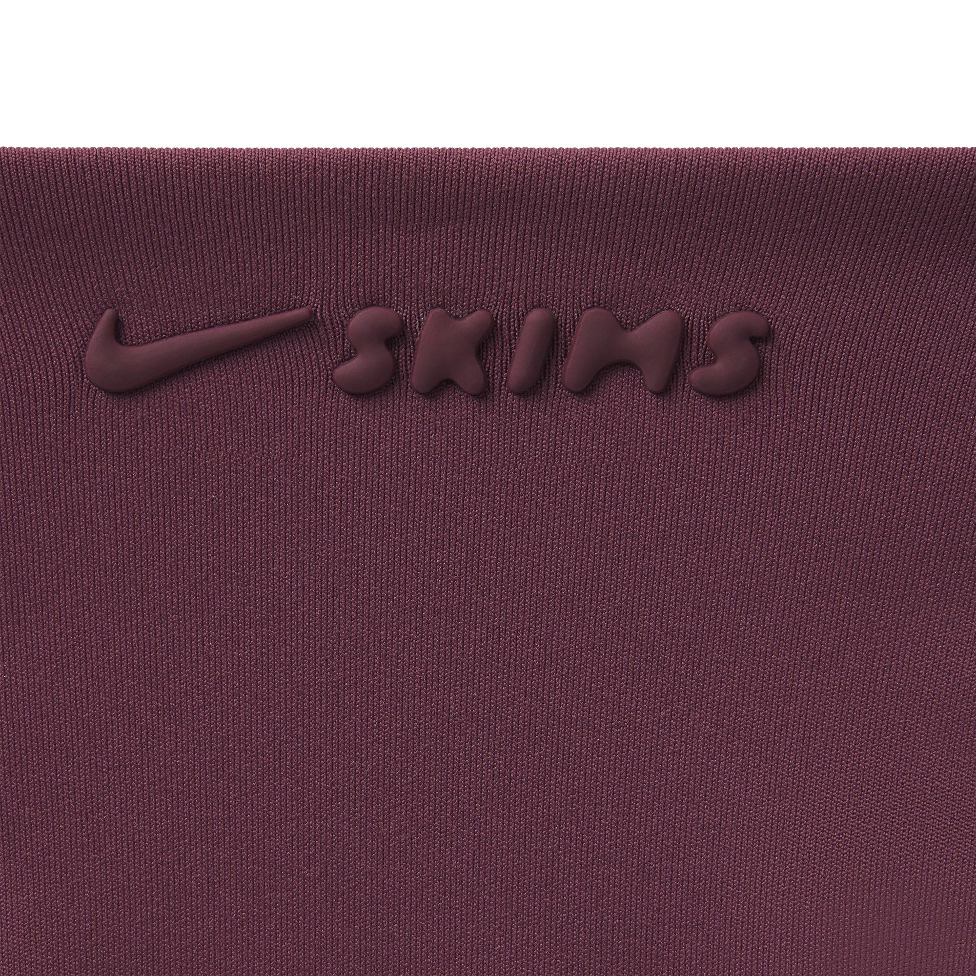 NikeSKIMS MATTE RACER BACK TANK | CURRANT ON A MODEL SIDE VIEW @ | FOCUS: 0.0, 1.0, 0.9