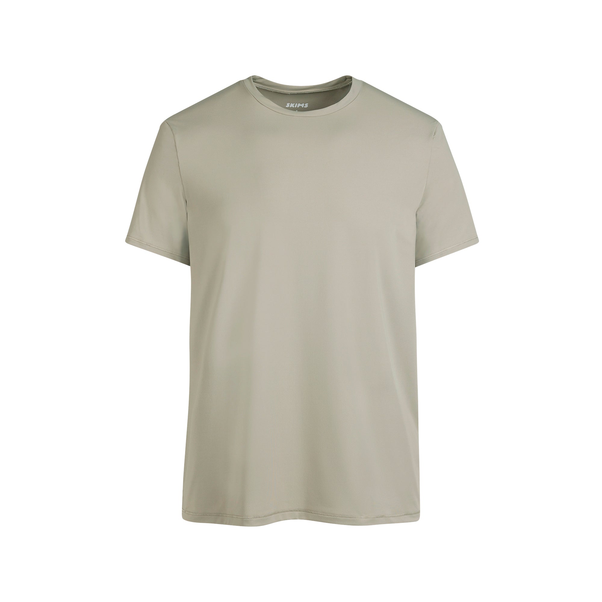 SKIMS SPORT MENS T-SHIRT | DUNE FLAT ON A WHITE BACKGROUND @ | FLT