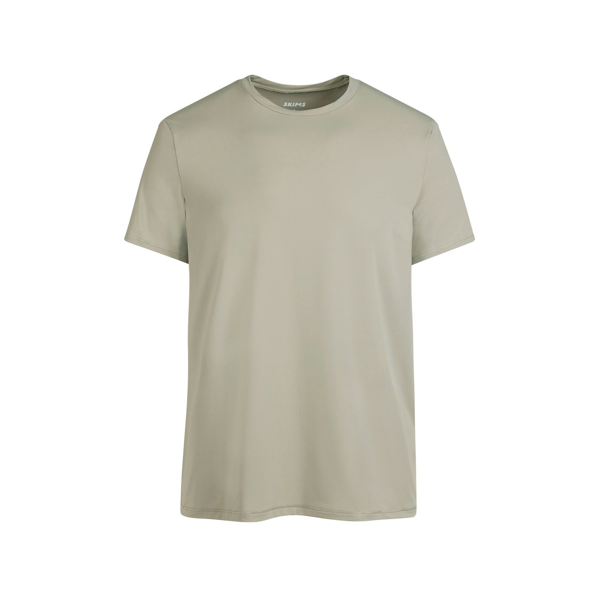 SKIMS SPORT MENS T-SHIRT | DUNE FLAT ON A WHITE BACKGROUND @ | FLT