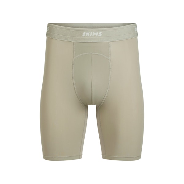 SKIMS SPORT MENS 7" BOXER BRIEF | DUNE FLAT ON A WHITE BACKGROUND | FLT