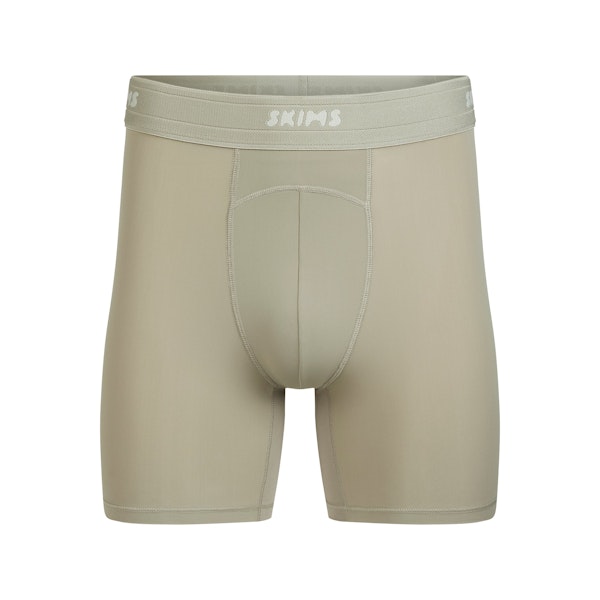 SKIMS SPORT MENS 5" BOXER BRIEF | DUNE FLAT ON A WHITE BACKGROUND | FLT