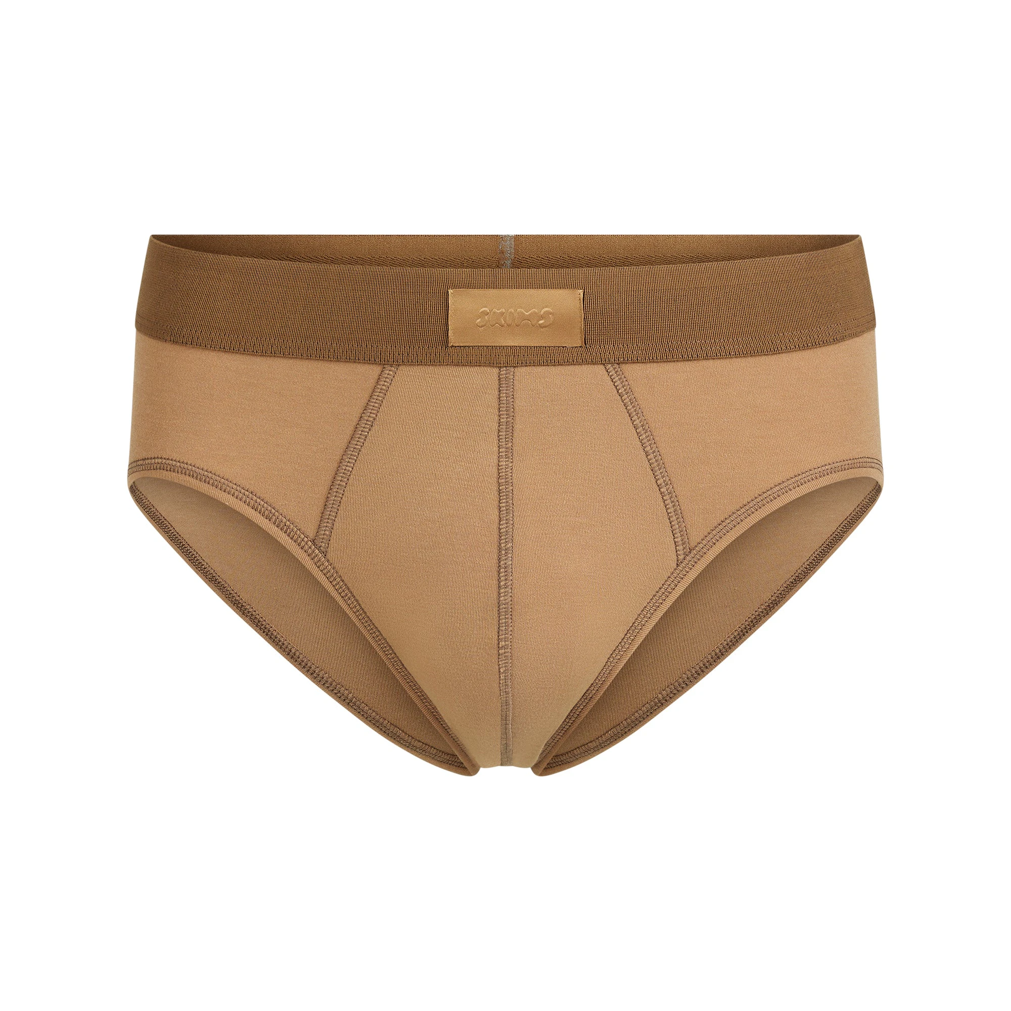 SKIMS COTTON MENS BRIEF | RUSSET FLAT ON A WHITE BACKGROUND | FLT