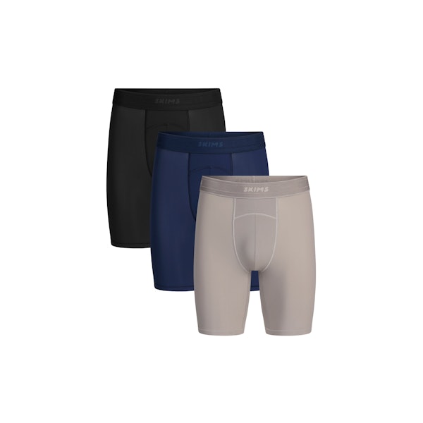 SKIMS SPORT MENS 7 INCH BOXER BRIEF 3-PACK | NAVY SMOKE MULTI FLAT ON A WHITE BACKGROUND | FOCUS: 0.9, 0.1, 0.7
