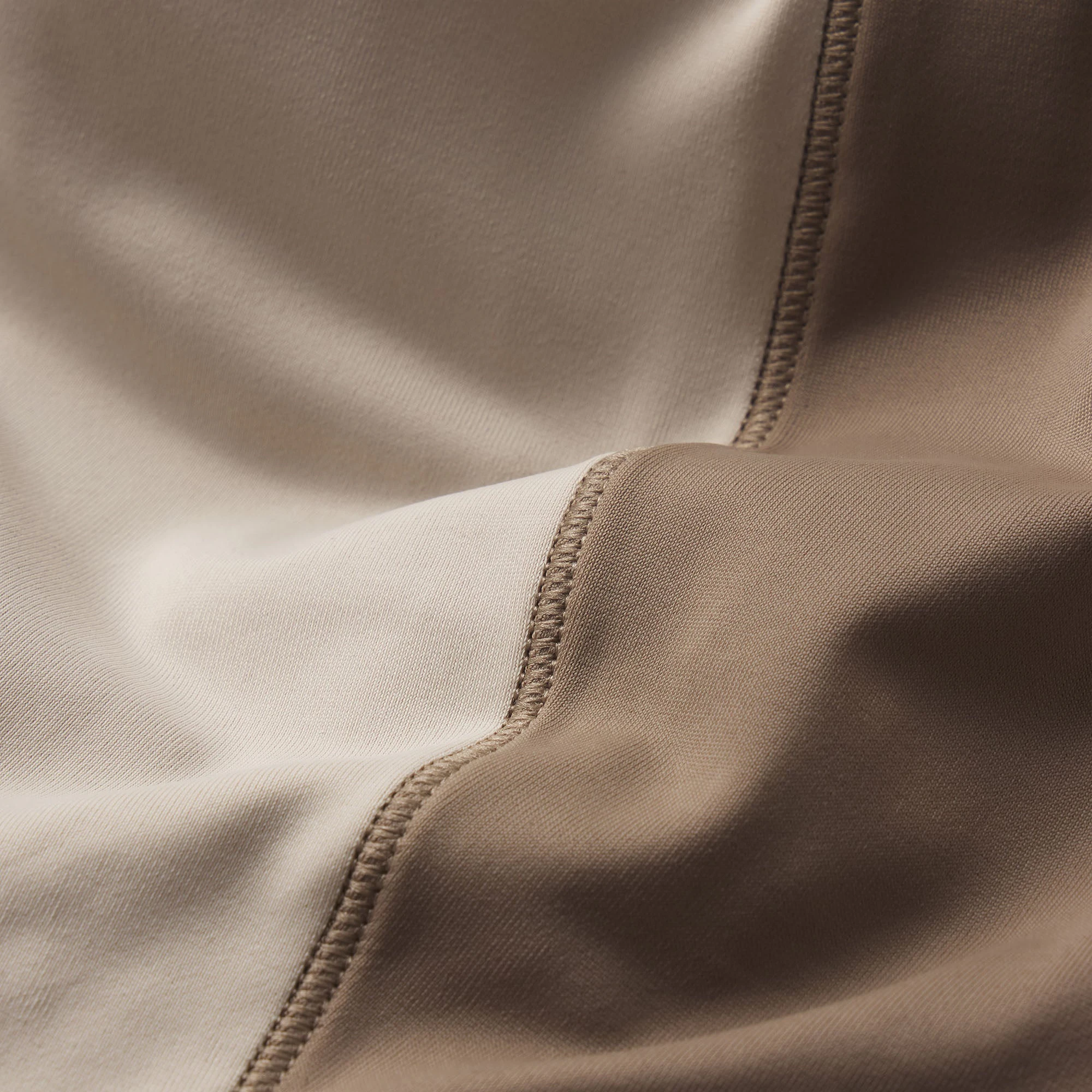 NikeSKIMS SHINE ZIP FRONT LONG ONESIE | TRUFFLE AND STONE ADDITIONAL FABRIC DETAILS