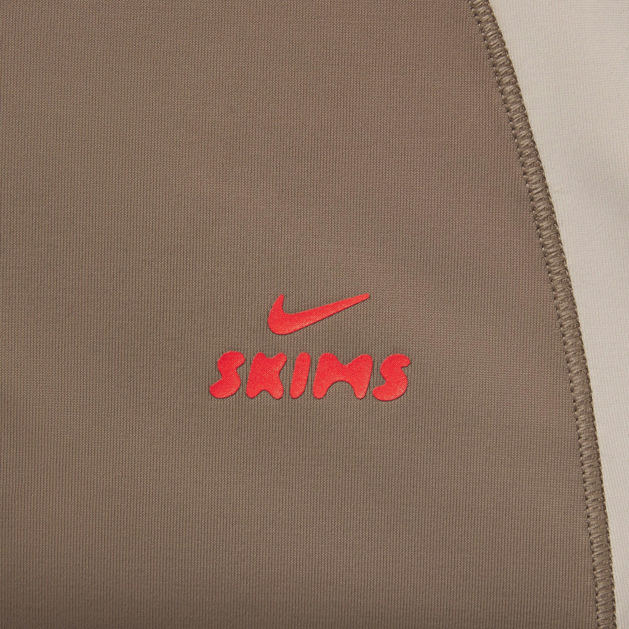 NikeSKIMS SHINE ZIP FRONT LONG ONESIE | TRUFFLE AND STONE ADDITIONAL FABRIC DETAILS