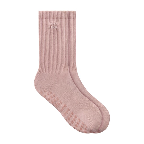 NikeSKIMS ACCESSORIES DRI-FIT PILATES GRIP CREW SOCK | HIMALAYAN FLAT ON A WHITE BACKGROUND
