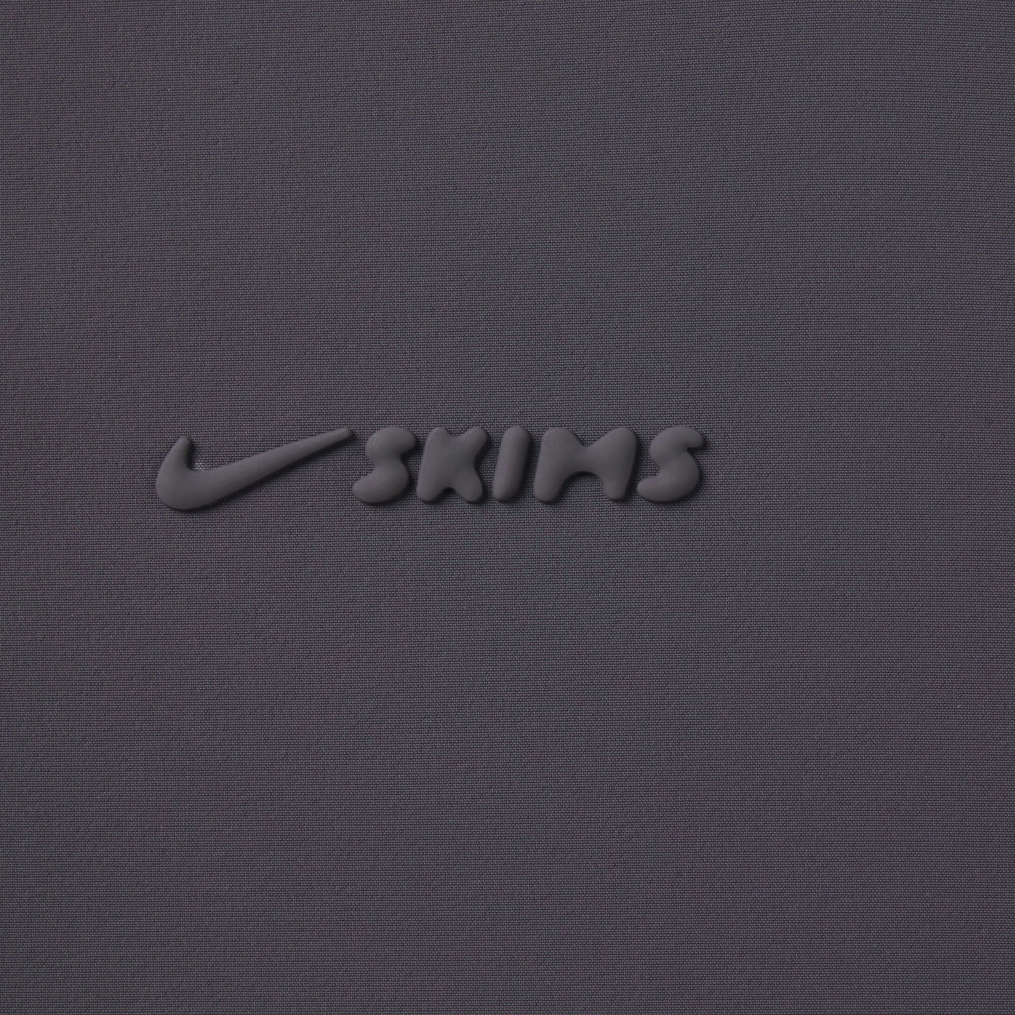 NikeSKIMS WOVEN NYLON OVERSIZED TRACK PANT | RAVEN ADDITIONAL FABRIC DETAILS