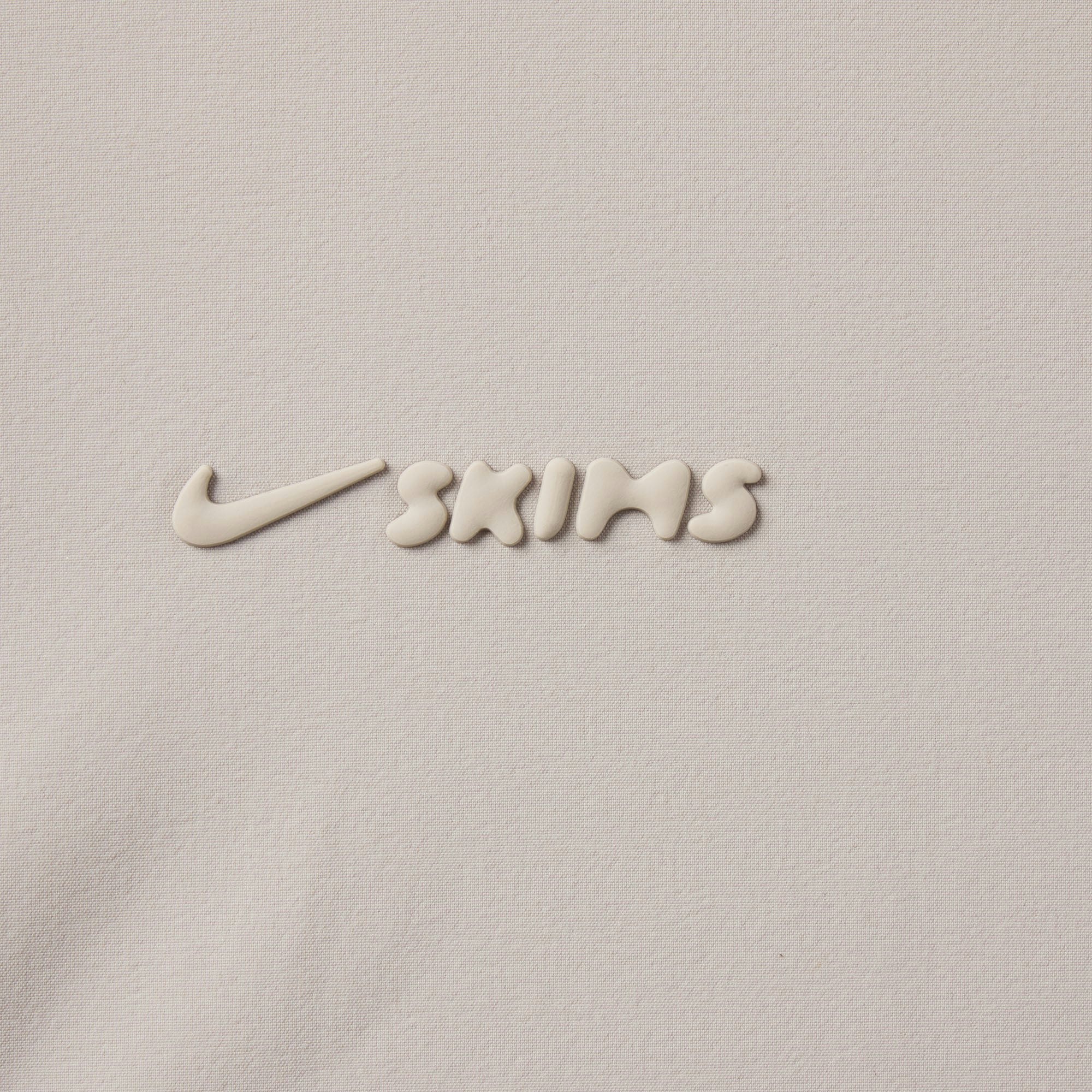 NikeSKIMS WOVEN NYLON 2.5" RUNNER SHORT | STONE ADDITIONAL FABRIC DETAILS