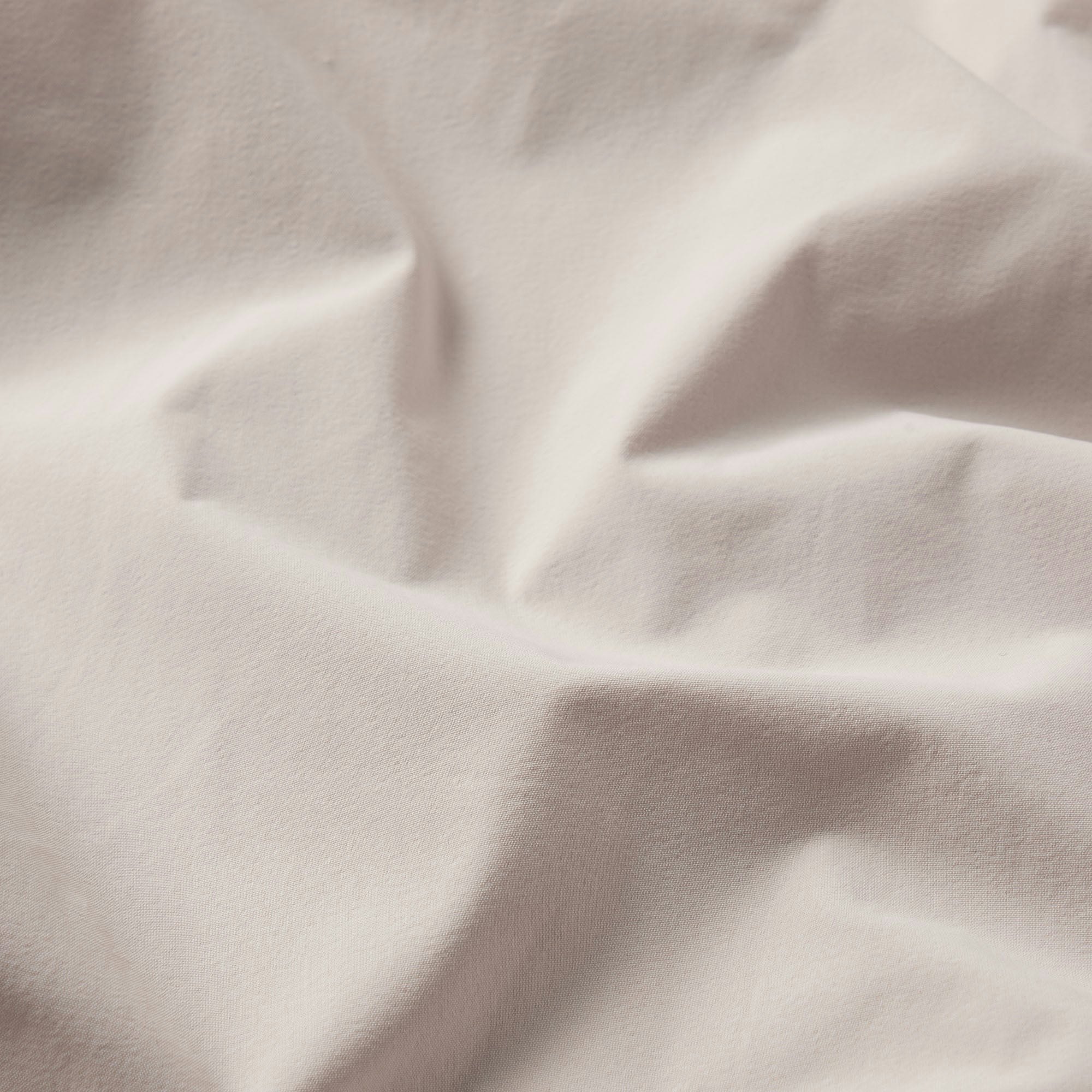 NikeSKIMS WOVEN NYLON OVERSIZED TRACK JACKET | STONE ADDITIONAL FABRIC DETAILS