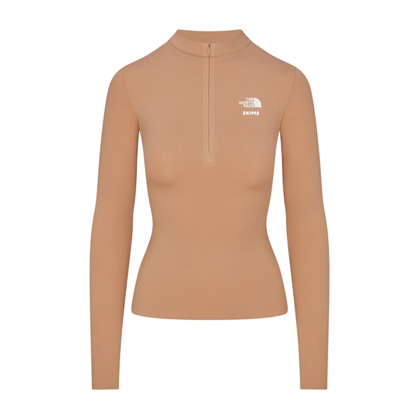 THE NORTH FACE X SKIMS REFINA LONG SLEEVE TOP | OCHRE FLAT ON A WHITE BACKGROUND | FLT