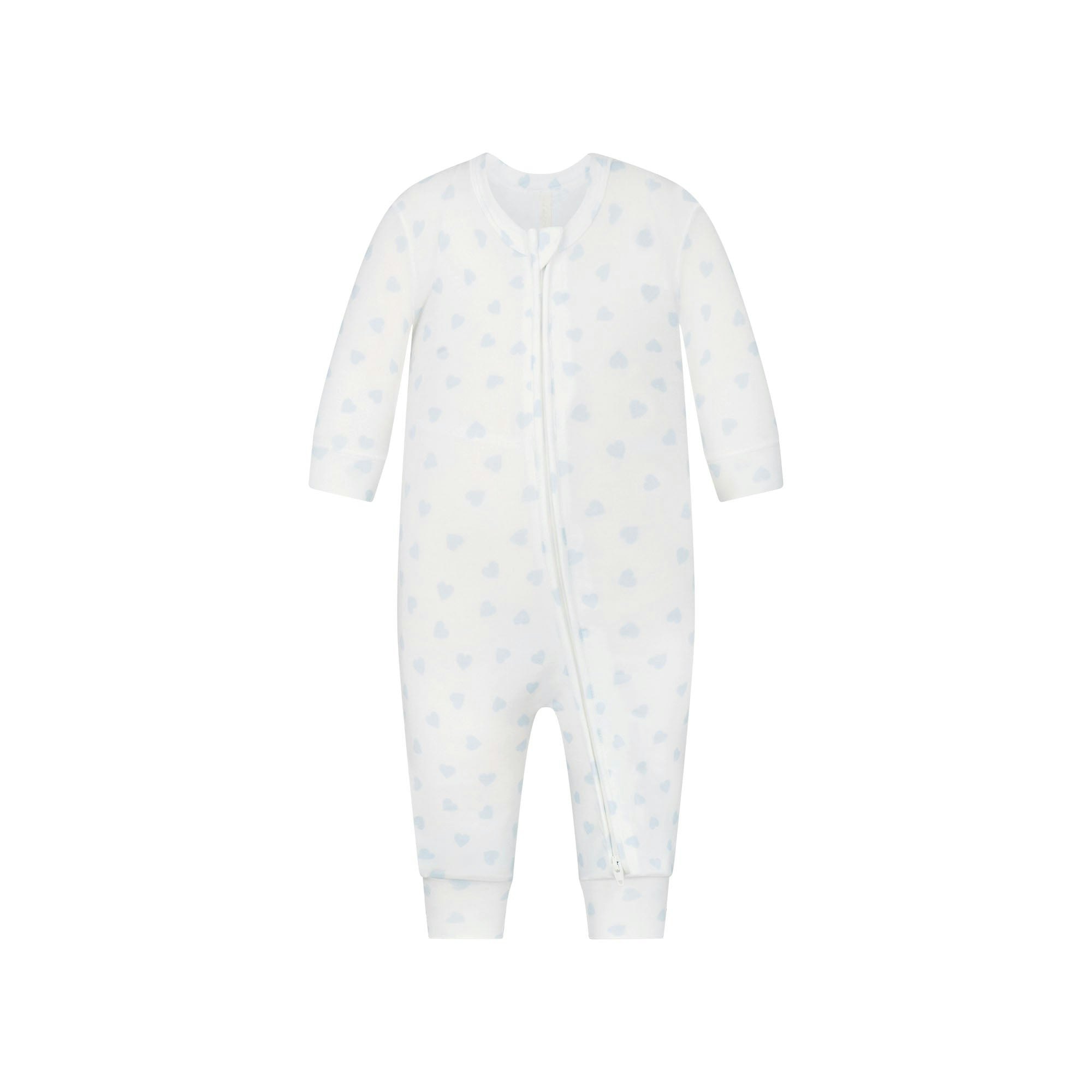SKIMS SLEEP BABY ONESIE | MARBLE CLOUD HEART PRINT FLAT ON A WHITE BACKGROUND | FLT