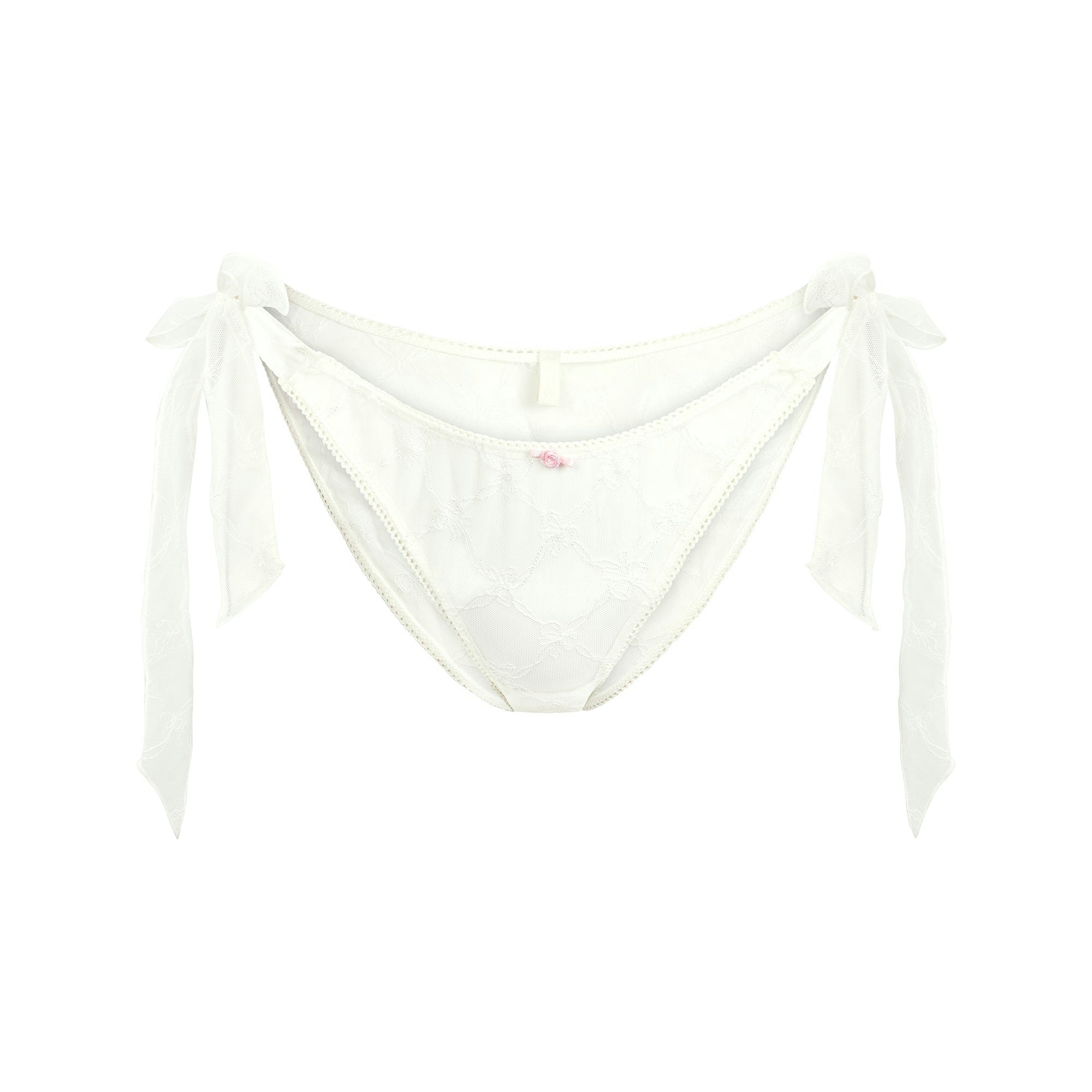 SPRING INTIMATES TIE SIDE BRIEF | MARBLE BOW TULLE FLAT ON A WHITE BACKGROUND | FLT