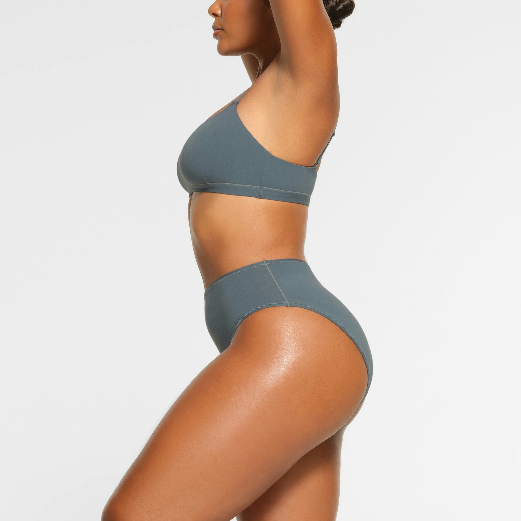 SIDE VIEW OF THE COTTON JERSEY FULL BRIEF ON A MODEL