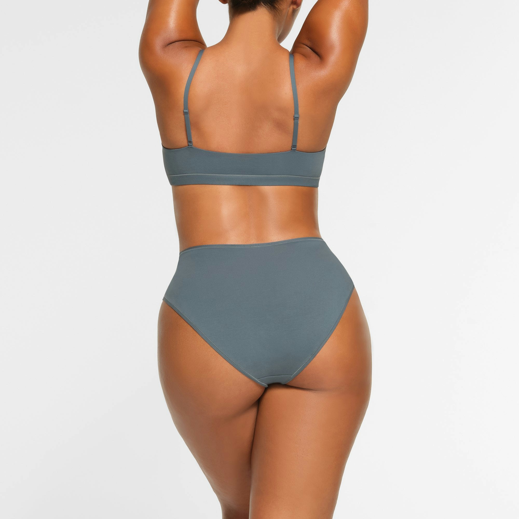 BACK VIEW OF THE COTTON JERSEY FULL BRIEF ON A MODEL