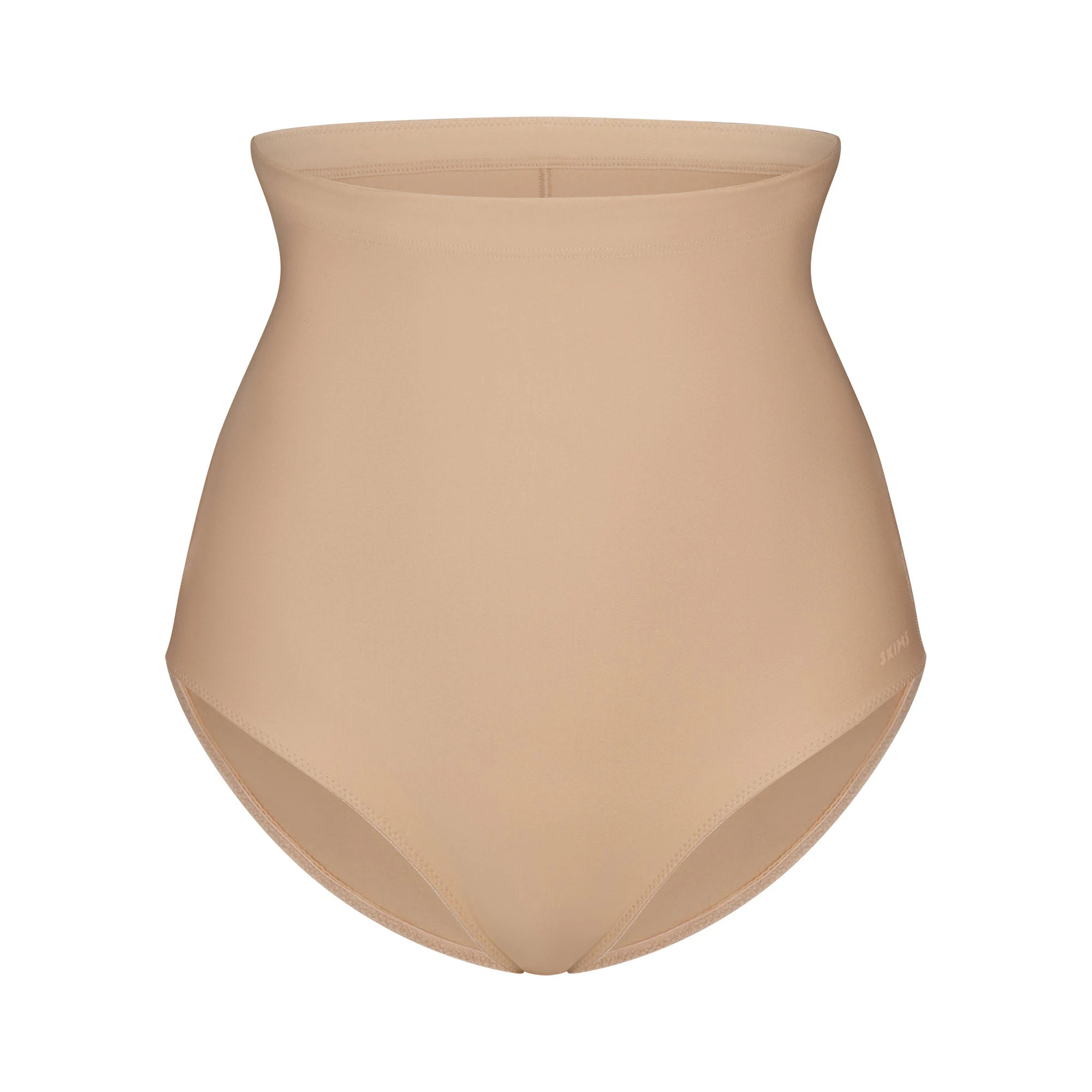 SKIMS BODY CORE SCULPT BUTT LIFTING BRIEF | CLAY FLAT ON A WHITE BACKGROUND | FLT