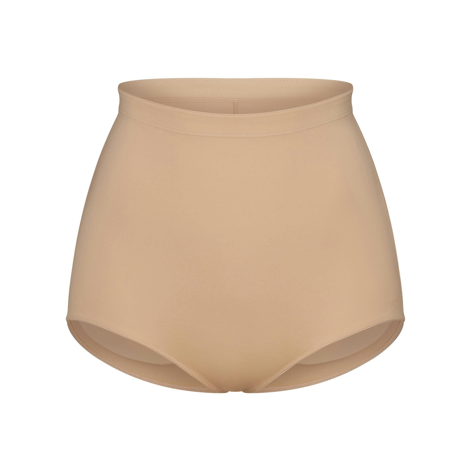 SKIMS BODY BUTT ENHANCING BRIEF | CLAY FLAT ON A WHITE BACKGROUND | FLT