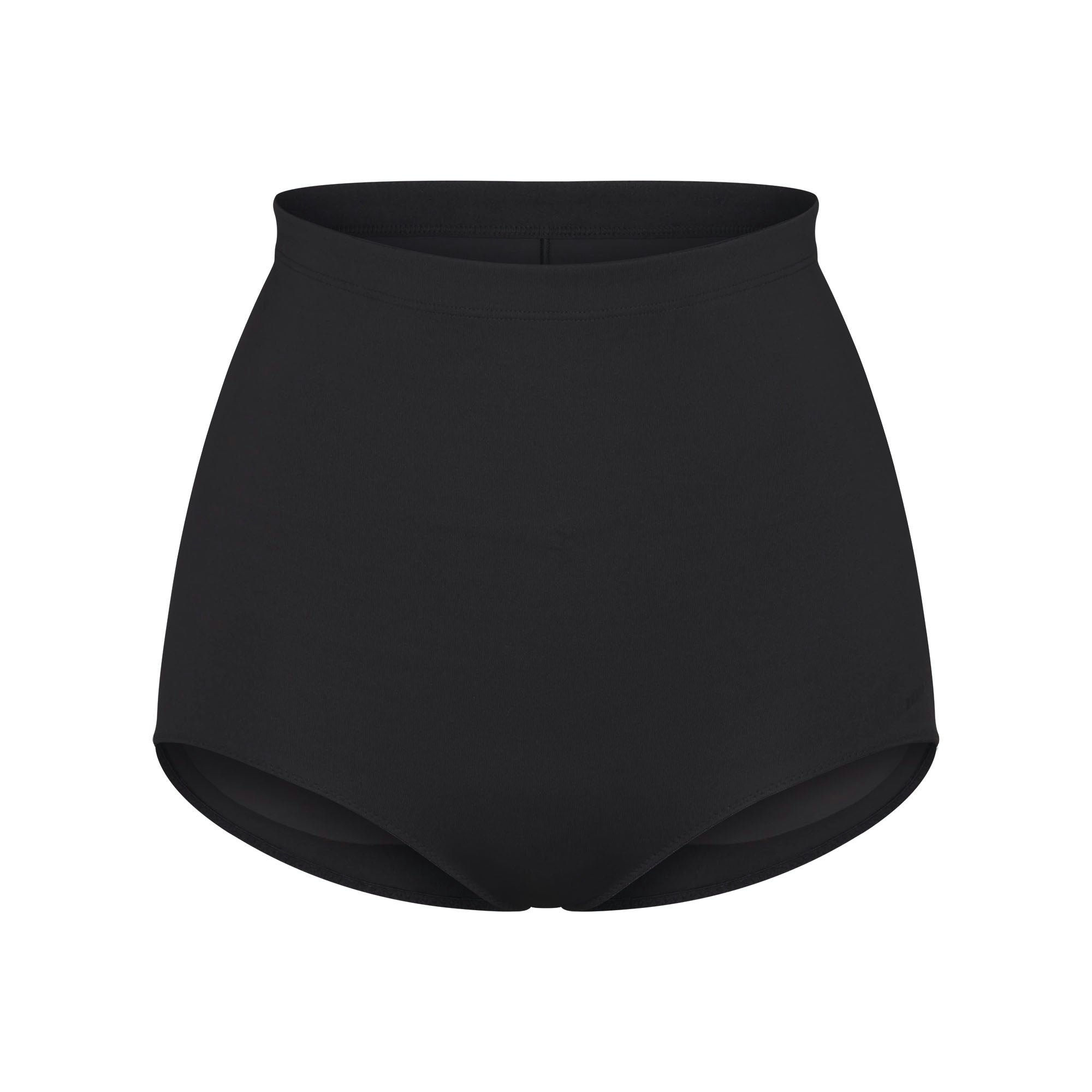 SKIMS BODY BUTT ENHANCING BRIEF | ONYX FLAT ON A WHITE BACKGROUND | FLT