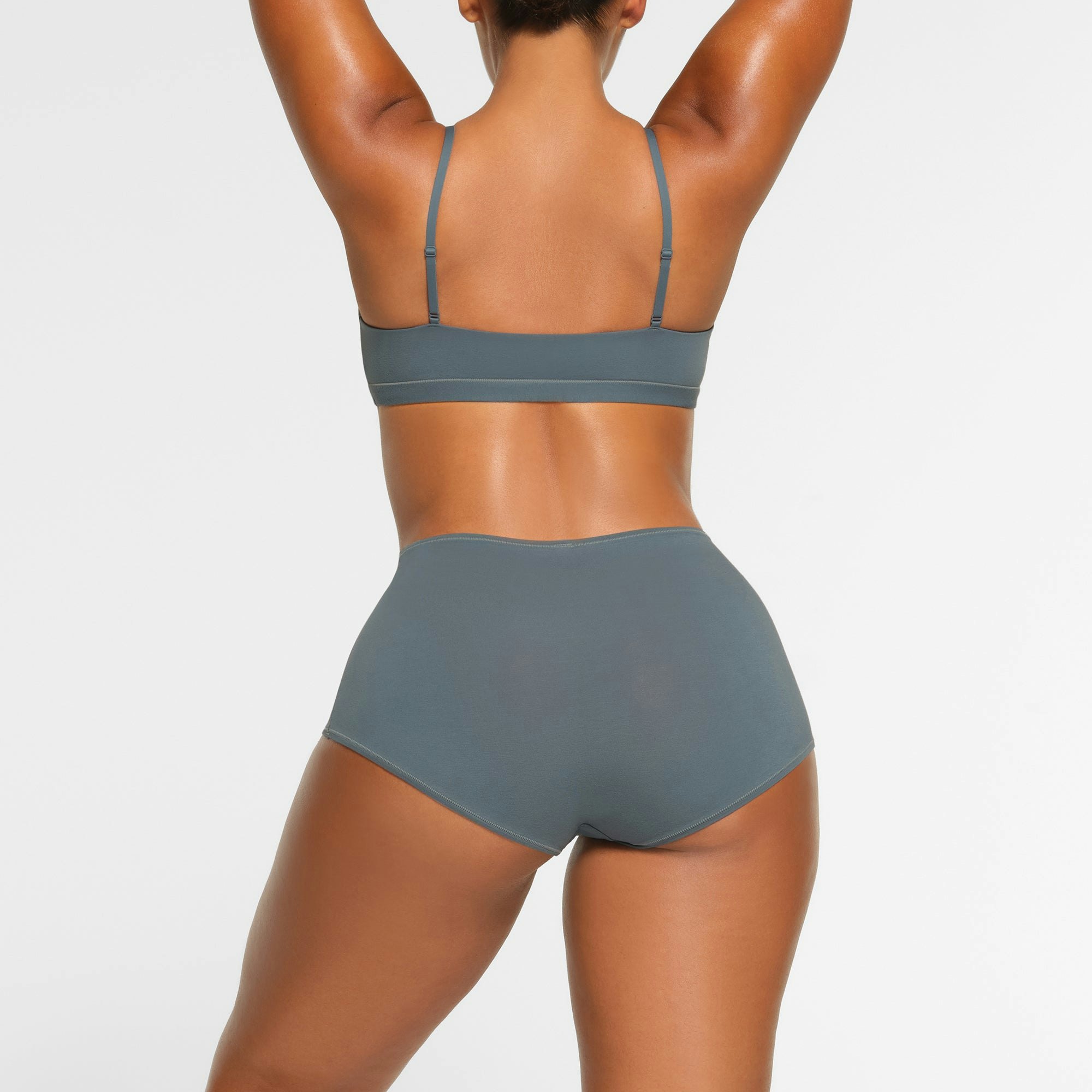 COTTON JERSEY BOY SHORT WORN BY A MODEL IN BACK VIEW