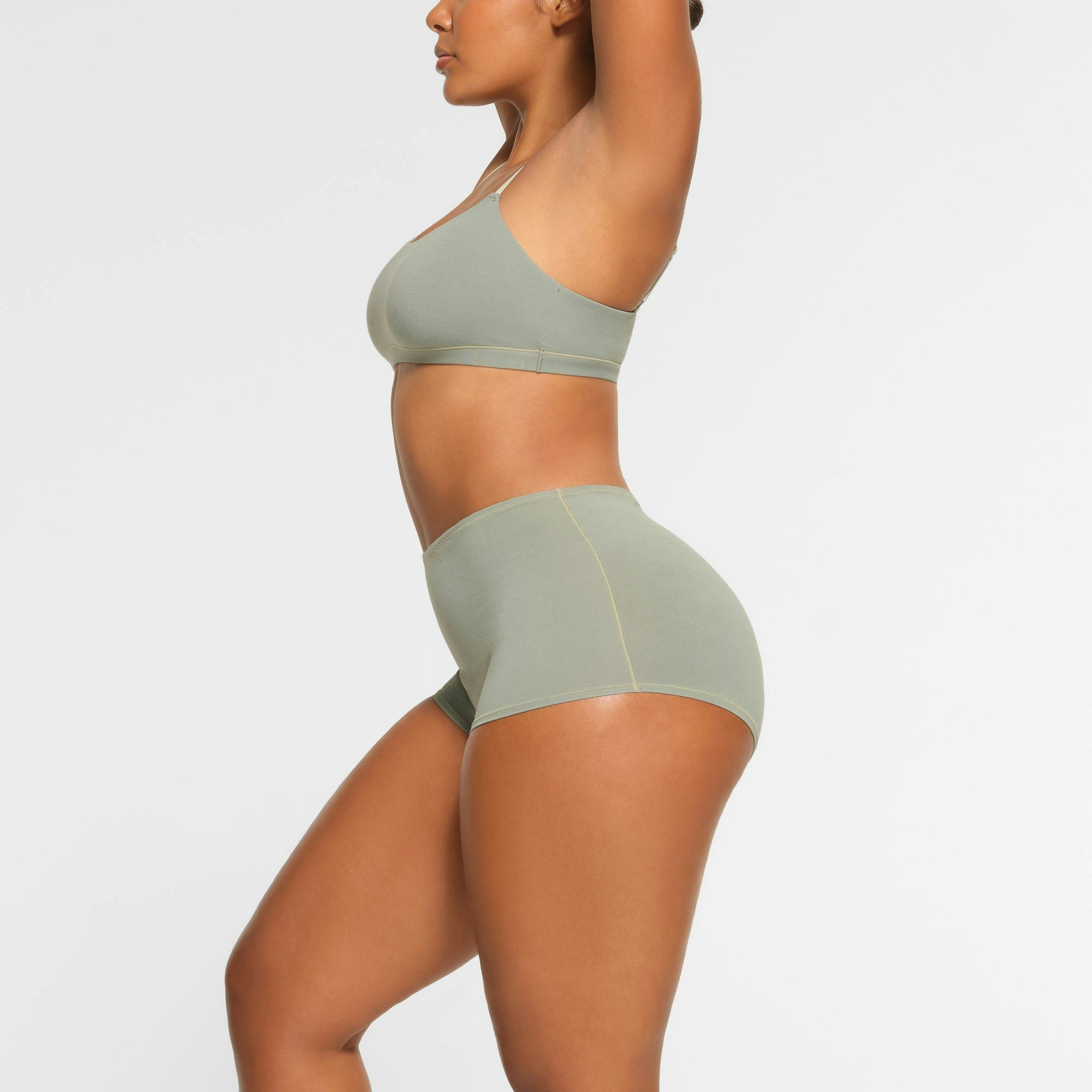 COTTON JERSEY BOY SHORT WORN BY A MODEL IN SIDE VIEW