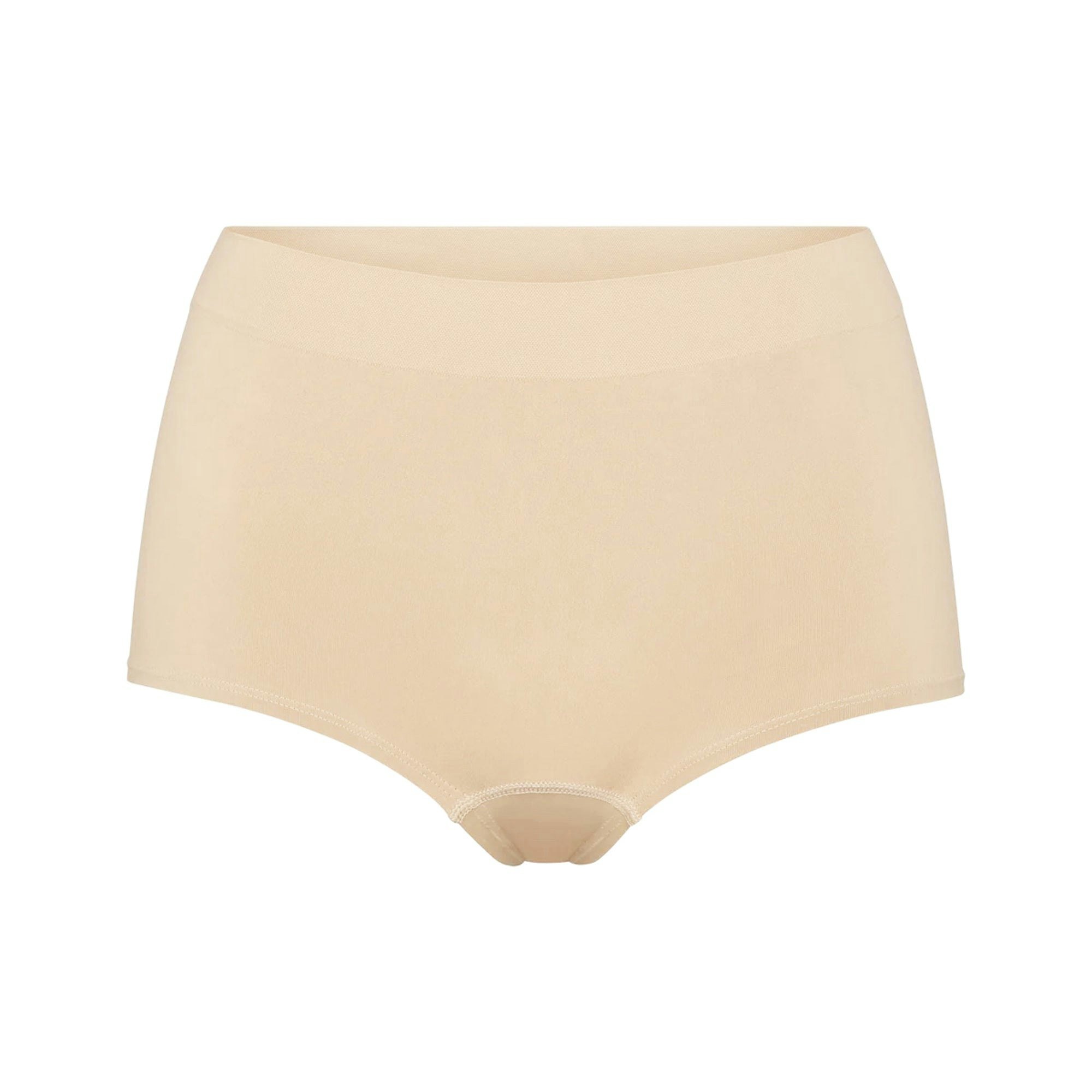 SOFT SMOOTHING SEAMLESS BOY SHORT LAYS FLAT ON A WHITE BACKGROUND