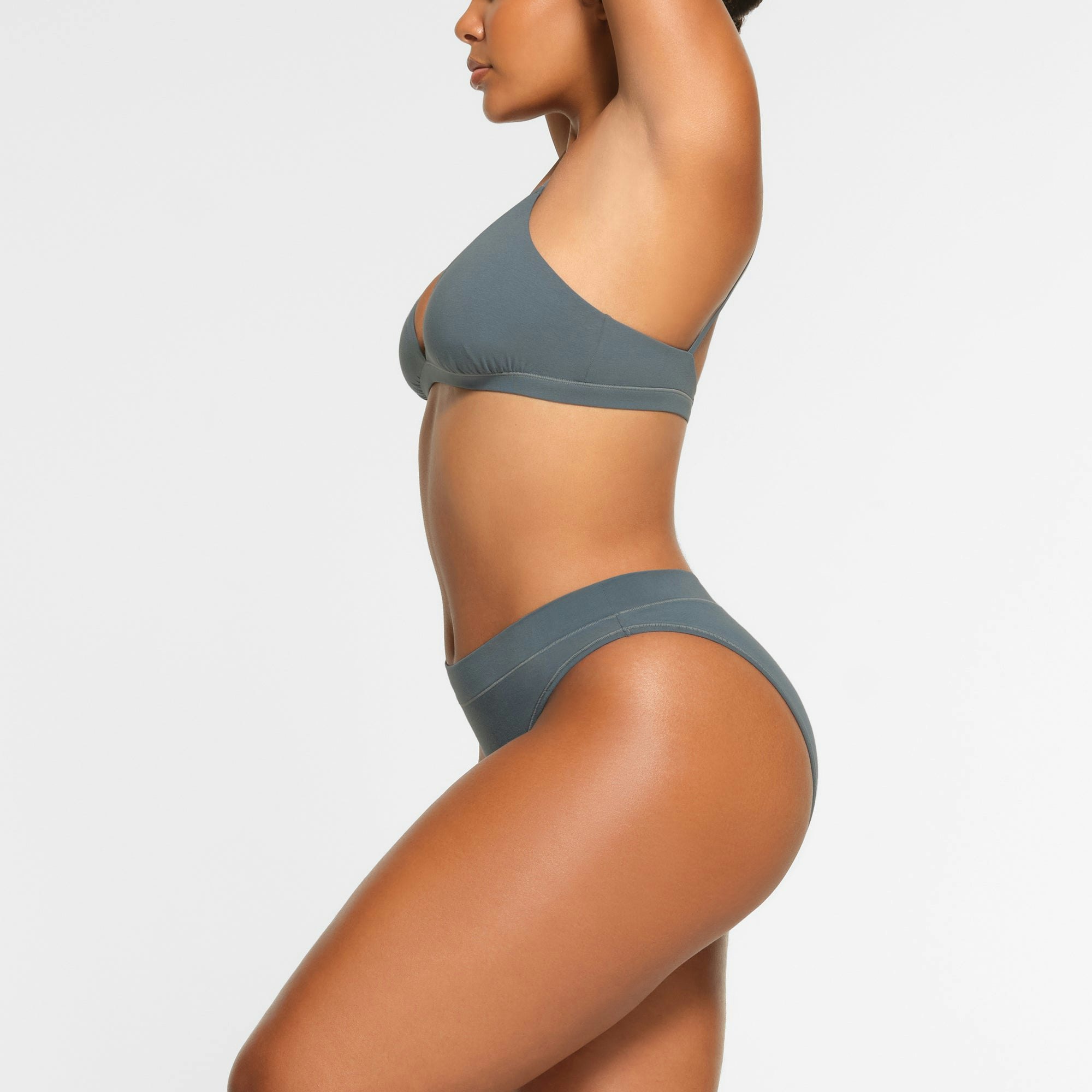 COTTON JERSEY CHEEKY TANGA WORN BY A MODEL IN SIDE VIEW