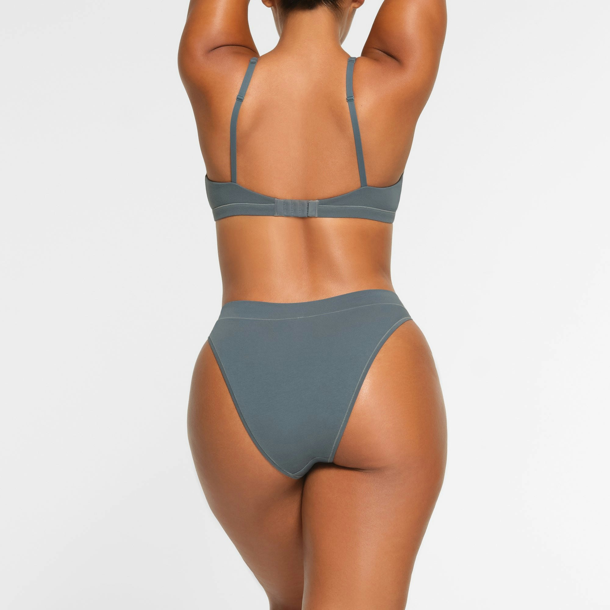 COTTON JERSEY CHEEKY TANGA WORN BY A MODEL IN BACK VIEW