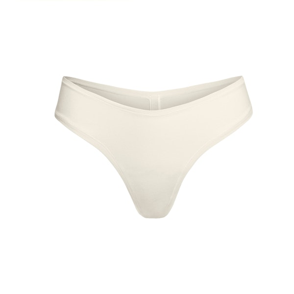 COTTON JERSEY DIPPED THONG | BONE FLAT ON A WHITE BACKGROUND | FLT
