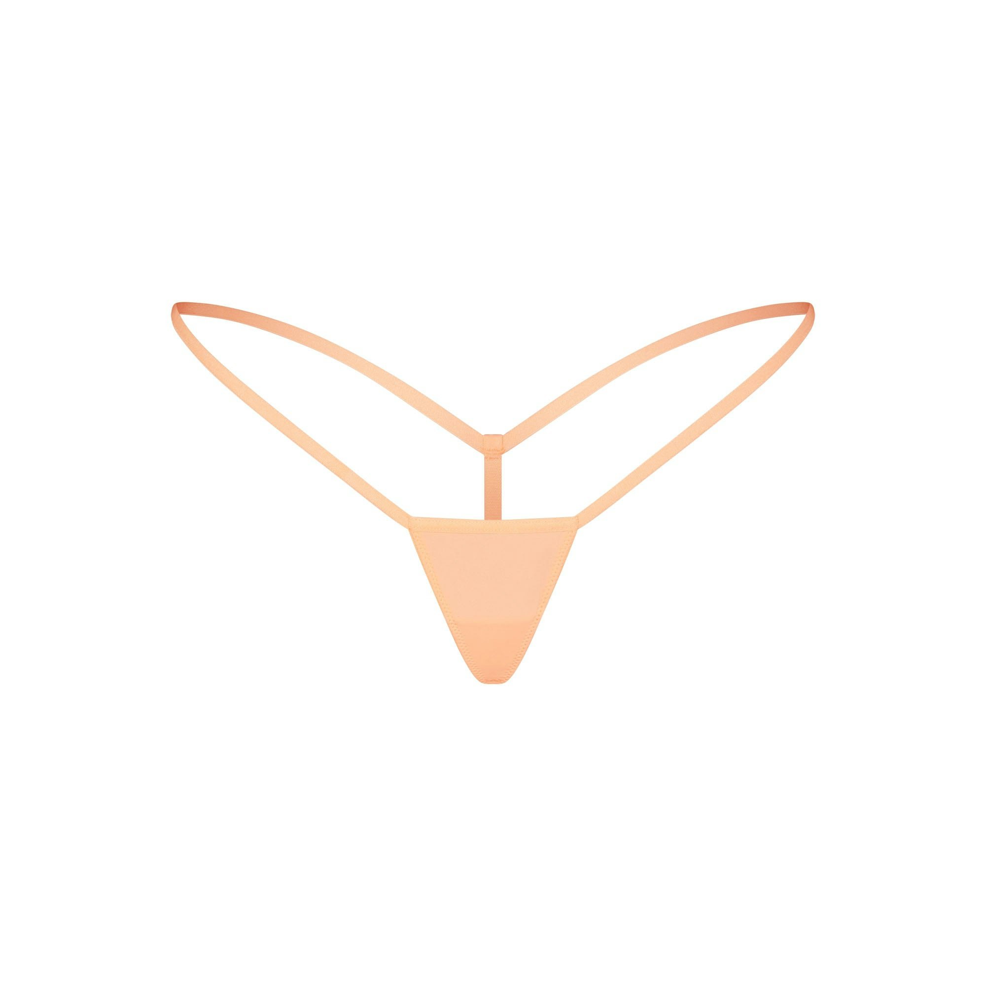 FITS EVERYBODY MICRO THONG | FADED NECTAR (THONGS, PANTIES) LAYS FLAT ON A WHITE BACKGROUND | FLT