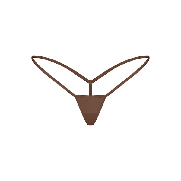 FITS EVERYBODY MICRO THONG | JASPER LAYS FLAT ON A WHITE BACKGROUND | FLT