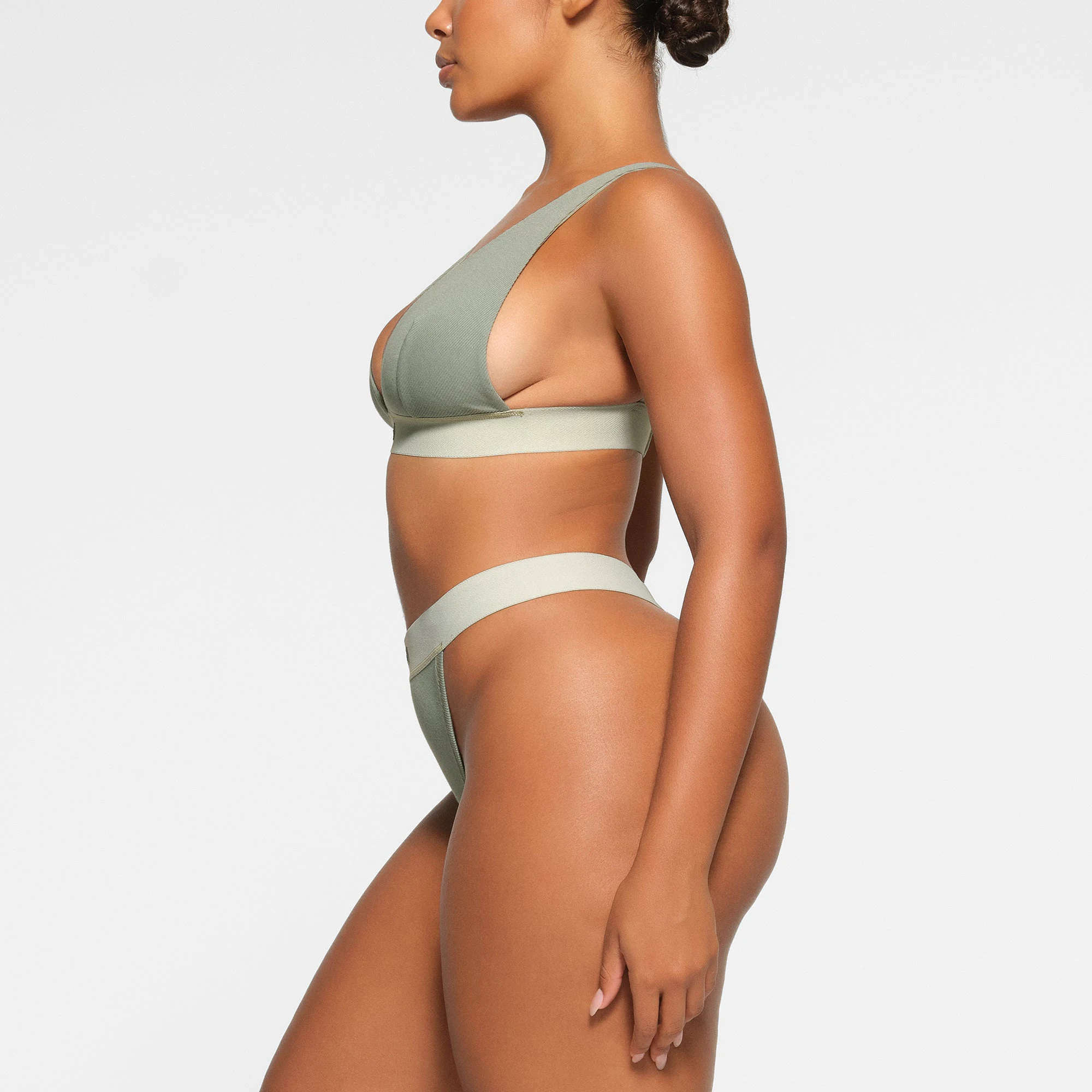 COTTON RIB THONG WORN BY A MODEL IN SIDE VIEW
