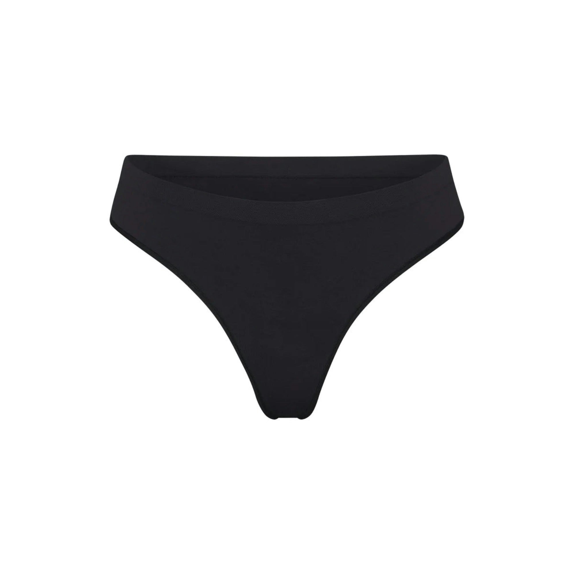 SOFT SMOOTHING SEAMLESS THONG | ONYX (THONGS, PANTIES) LAYS FLAT ON A WHITE BACKGROUND | FLT